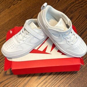 All white Nike shoes